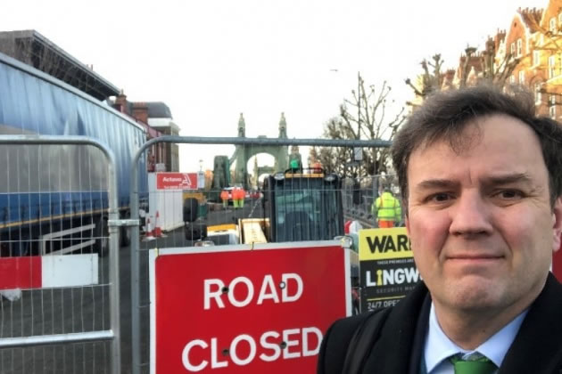 Greg Hands MP by Hammersmith Bridge 
