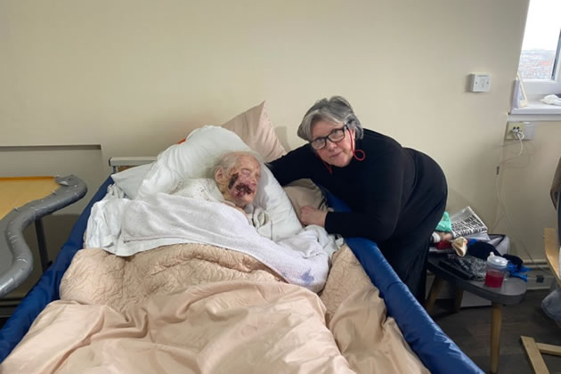 Winnie, 91, and Sue, 67, at their temporary 1-bed flat in Fulham