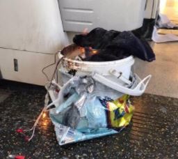 Burning bucket on District Line train