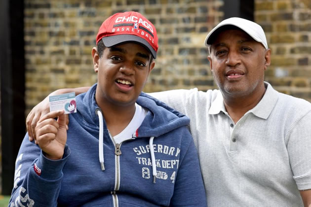 Caleb Fikru (pictured left) with his dad