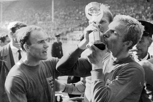 George Cohen with another former Fulham player after winning the World Cup