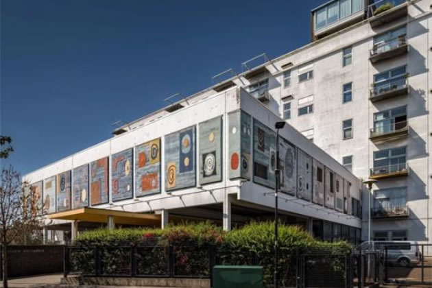 The large colourful fibreglass art panels on the former North Thames Gas Board 