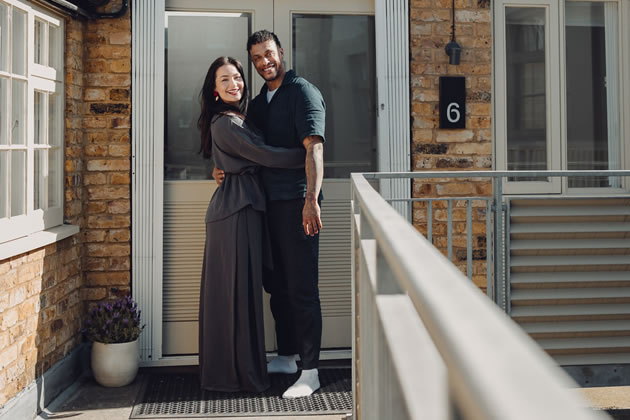 Megan Rose and Nathan outside their studio 