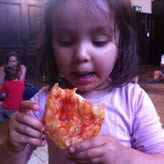 Child eating pizza