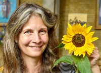 Lady with sunflower at Fulham Horticultural Society show