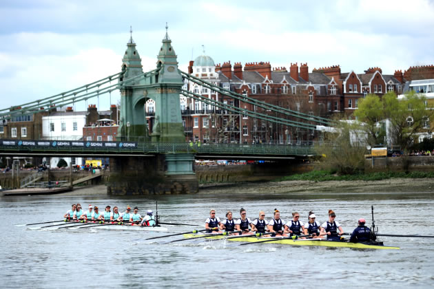 University crews pass underneath Hammersmith Bridge