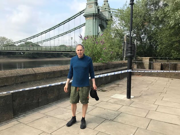 Peter Brill next to the cordoned off area next to Hammersmith Bridge 