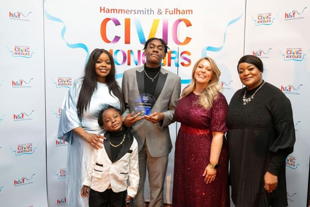 Raphael Chiwandire with Cllr Alex Sanderson, Deputy Leader of H&F, and his family