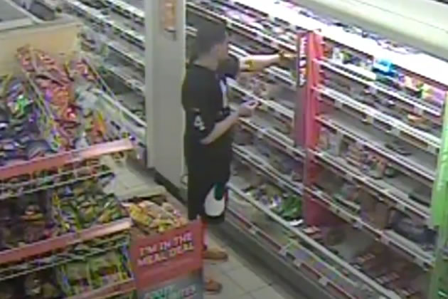 CCTV showing Leoaai Elghareeb injecting food in Sainsbury's 
