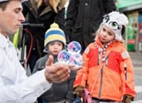 Children enjoy magic at North End Road Christmas Market