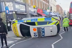 Man Charged After Crashing into Two Police Cars